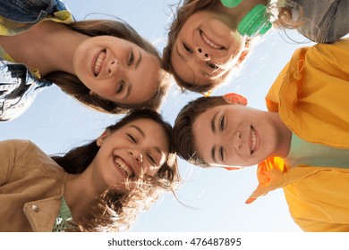 Friendship And People Concept - Group Of Happy Teenage Friends Outdoors