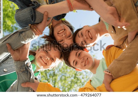 Similar – Sisters, teenage girl and her younger sister pushing hay bale playing together outdoors in the countryside