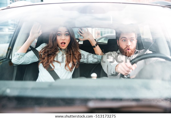 Frightened couple in car.\
beauty image