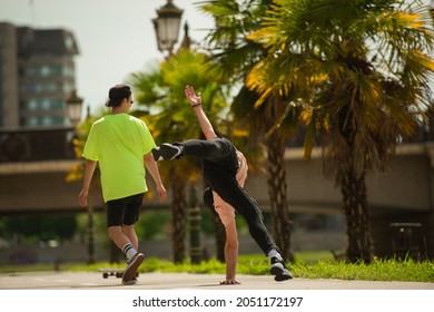 Frineds Hanging While One Of Them Is Acting Crazy Outside