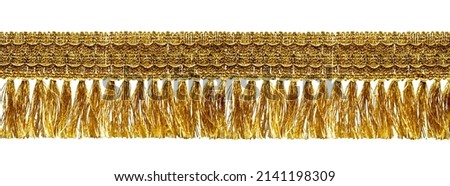 Fringe. Yellow braid with tassels. Isolated on white background