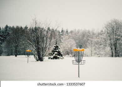 Frisbee Disc Golf Basket In The Winter, Snowy Landscape