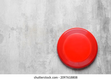 Frisbee Disk On Grunge Background