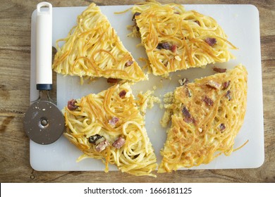 Frittata Of Pasta Made With Spaghetti And Speck