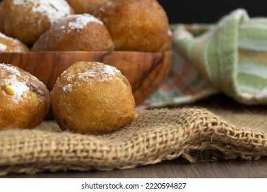 Fritters on a wooden plate on a table - Powered by Shutterstock