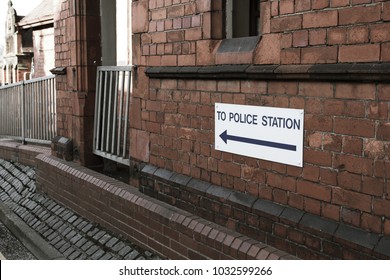 Frodsham, Cheshire, UK, February 2018 - Local Police Station Sign On The Side Of A Old Brick Building.