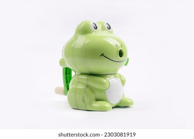 Frog  shaped pencil sharpener  green   white