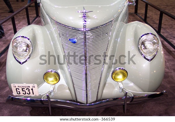 front of antique
car