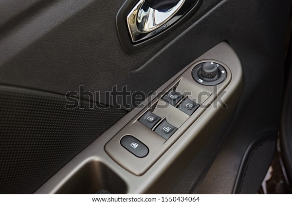 Front and back electric windows\
buttons-lower or close car windows. Leather upholstery, chrome and\
silver ornaments. Adjustable folding mirrors left and\
right.