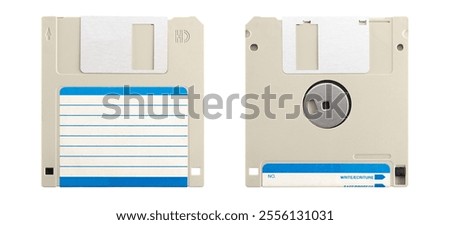 Front and back side of diskette or floppy disk, magnetic data storage medium for computer. Diskette with blank label isolated over white background.