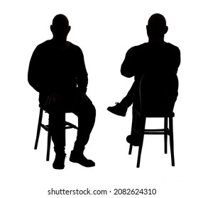 front and back of view of the silhouette of a man sitting on chair with casual clothes  - Powered by Shutterstock