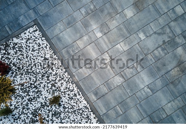 Front or back yard landscape design of stone tile\
pavement. Exterior from\
above