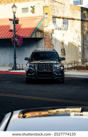Similar – Image, Stock Photo Parked police car in old town