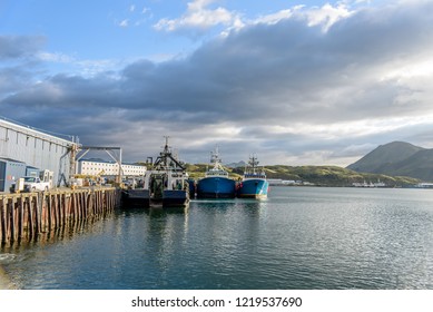 A Front Bow View of Alaskan Fishing Crab Boats at Port in Dutch Harbor Alaska