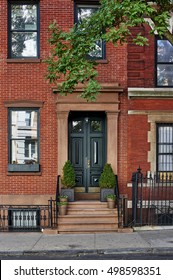 The Front Of A Brownstone Building