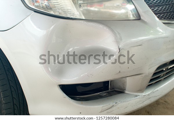 front bumper car dent by\
accident