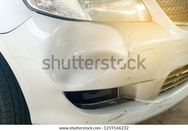 front bumper car dent by\
accident