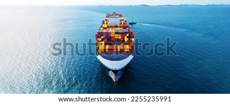 Front of cargo ship carrying container and running for export goods from cargo yard port to custom ocean concept technology transportation , customs clearance. Freight Forwarding Service