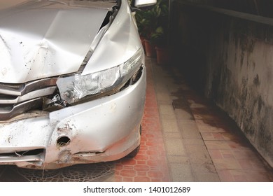 Front Damage Car From Hard Accident In Home Garage. Dangerous From Vehicle Using 