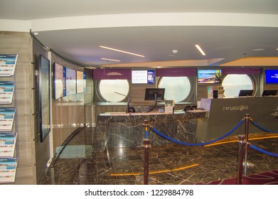 The front Desk of a cruise ship overlooking the tour Desk MSC Meraviglia, October 8, 2018.