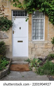 Front Door Of A Beautiful Old Cottage House On A Street In An English Town