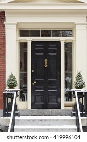 Front Door Close Up With Steps With A Dusting Of Snow