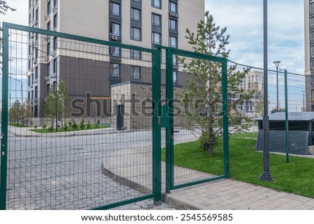 Front door of the courtyard. Remote control to open swing gate door by motor automation is home security system