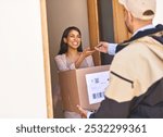 Front door, delivery man and woman with package, tablet and courier with ecommerce. Apartment, employee and customer with parcel, friendly service and technology for signature, box and supply chain