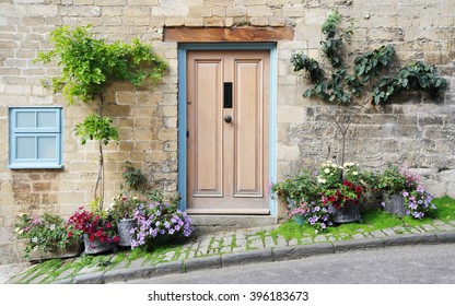 Front Door And Exterior Of A Beautiful Old English Cottage