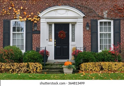 Front Door Of House In Fall