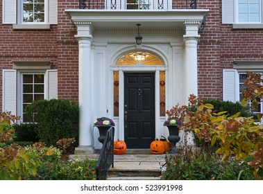 Front Door Of House With Halloween Decorations