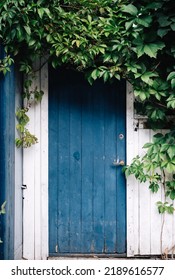 A Front Door Of A Small House In Norway.