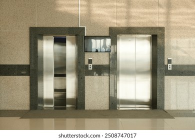 In front of the elevator, the doors are opening. - Powered by Shutterstock