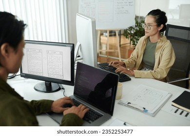 Front end developers working on website for new project
