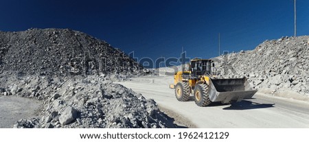 Similar – Bucket-wheel excavator in the Garzweiler 2 open-cast lignite mine, lignite-fired power plants in the background