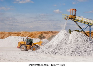 Front End Loader And Gypsum Stock Pile