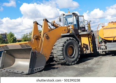 Front end loader or pay loader in operations action