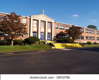 front entrance for an old catholic high school
