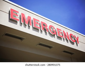 The Front Entrance Sign To An Emergency Room Department In A City Hospital