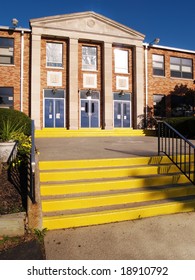 front entrance and steps for an old catholic high school