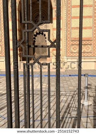 Front entry of a synagogue through metal gates