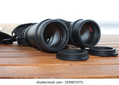 Front facing lenses of birdwatching binocular . Selective focus. Shallow depth of field