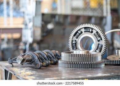 Front Gear Of Diesel Commonrail Engine On Metal Table In Heavy Machinery Workshop