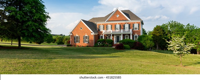 Front Of Home And Garage Of Large Single Family Modern US House Ideal For Social Media Page Of Realtor. Sized To Fit A Cover Photo Placeholder