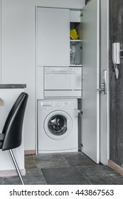 Front Load Washer With Open Closet In Modern Home Interior