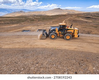 front loader leveling and profiling benches in mine