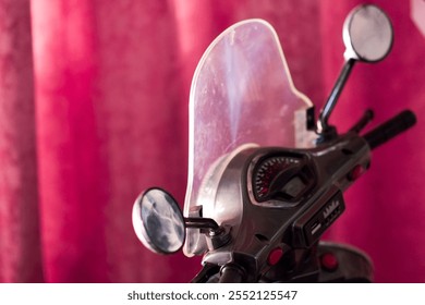 The front of the motorcycle is gray, the rear end is pink. - Powered by Shutterstock