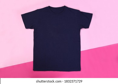 Front Navy Blue Tshirt On Pink Pastel Background