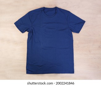 Front Navy Blue Tshirt Wooden Background