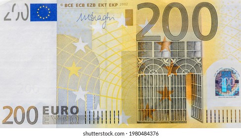 Front part of 200 euro banknote close-up with small details. European currency. Inflation, business, economics and finance theme.